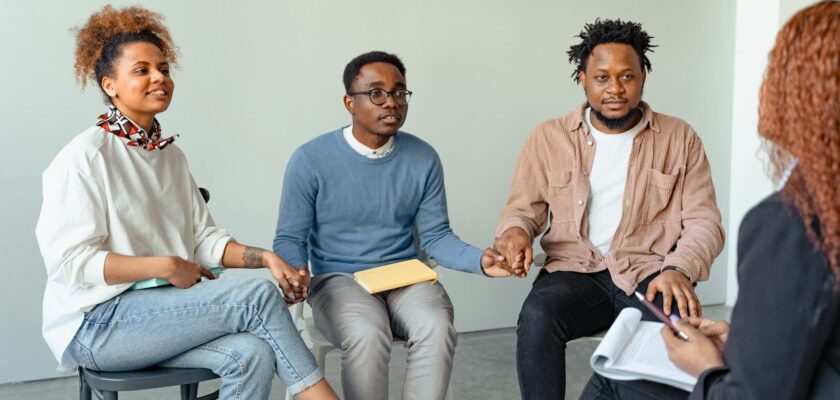 People in a Psychotherapy Session with a Psychologist